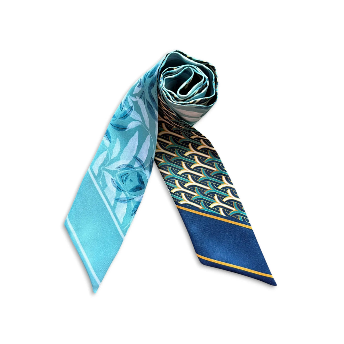 Modern purse scarf combining soft blue floral artwork with structured navy and gold geometric details.