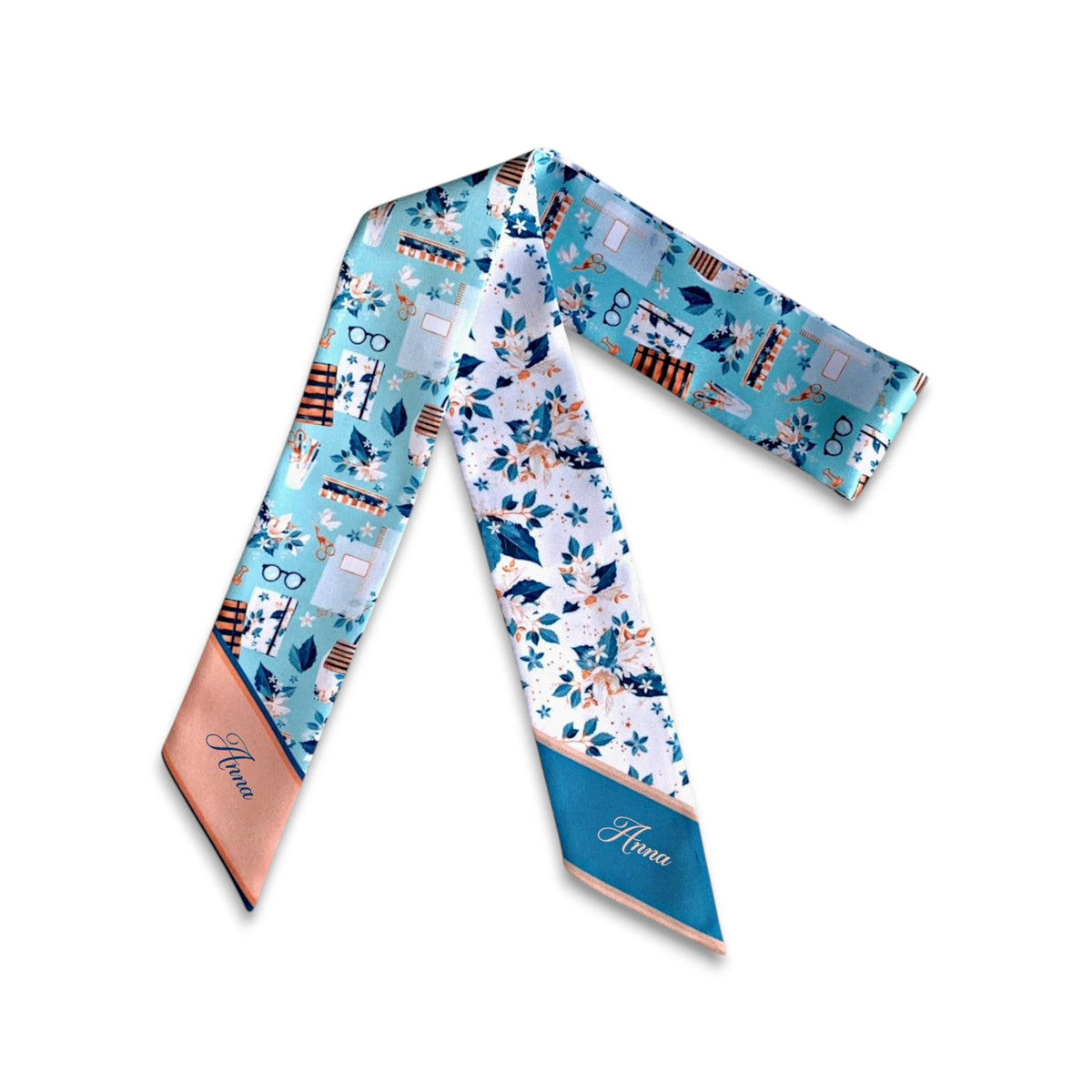 Blue handbag twilly scarf featuring playful school-themed illustrations, delicate florals, books, glasses, and soft peach accents.