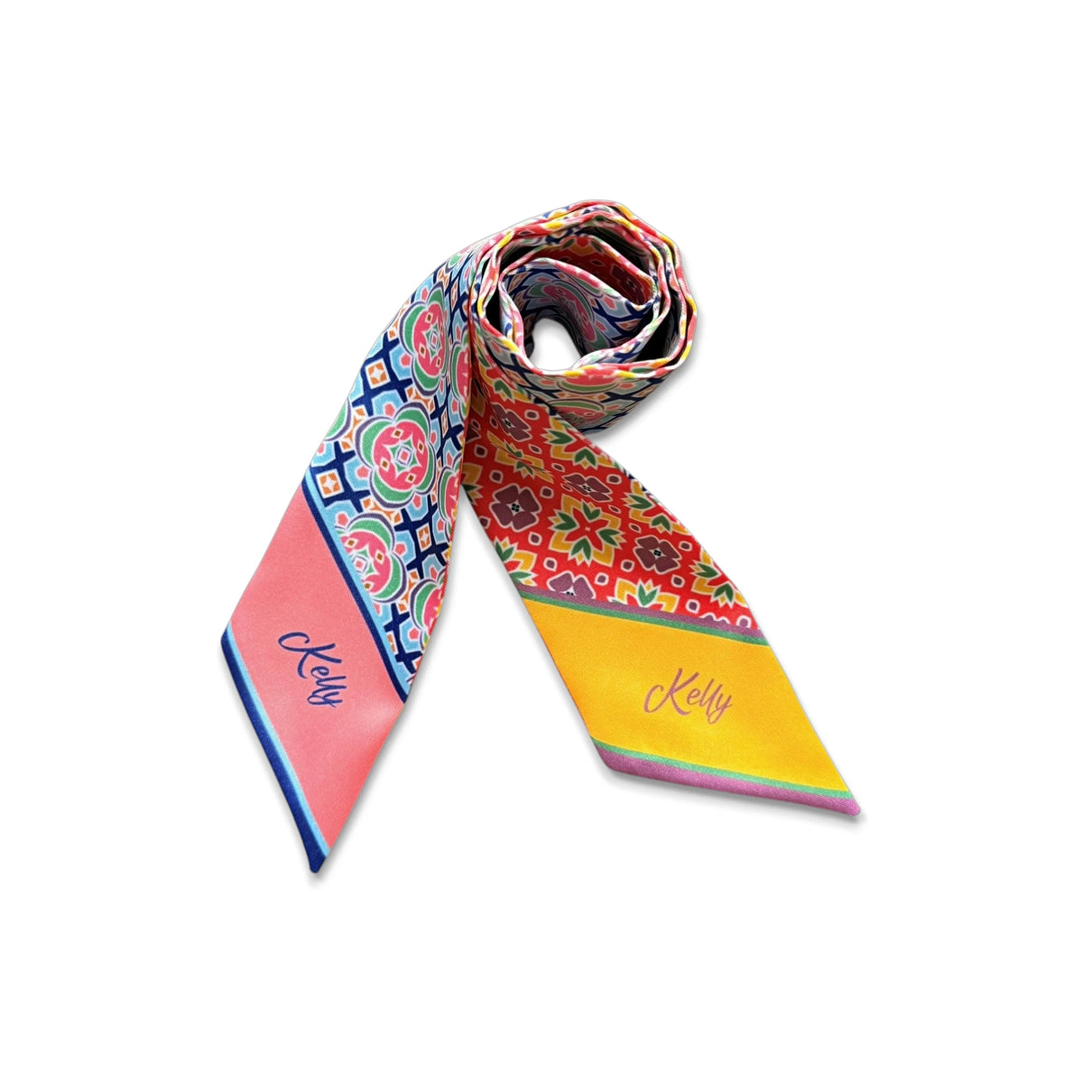 Colourful purse twilly scarf with intricate geometric patterns, contrasting red and blue sections, and personalised ends.