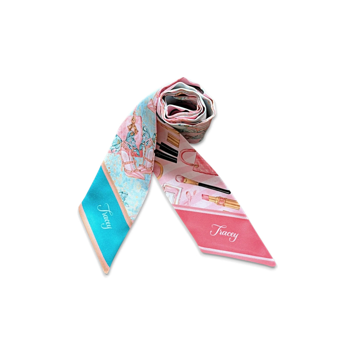 Two narrow satin twilly scarves with coordinated pink and turquoise fashion prints, displayed on a cream background with flowers and vintage books, suitable for accessorising handbags and tote bags.