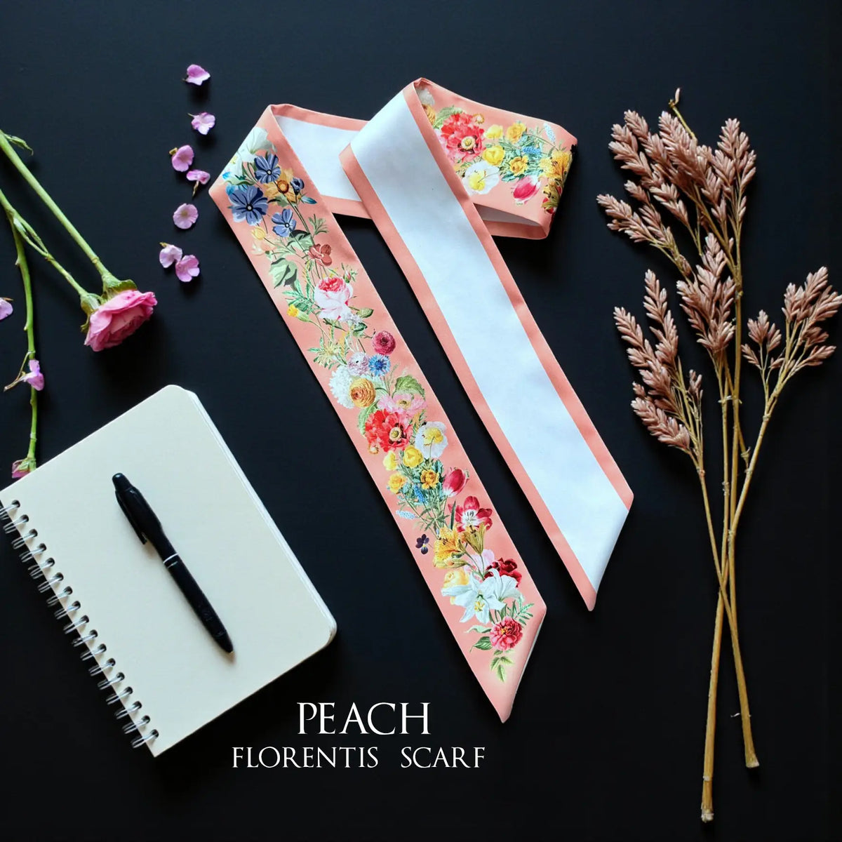 Peach personalised twilly scarf featuring colourful watercolour wildflowers, soft peach borders, and custom name lettering.
