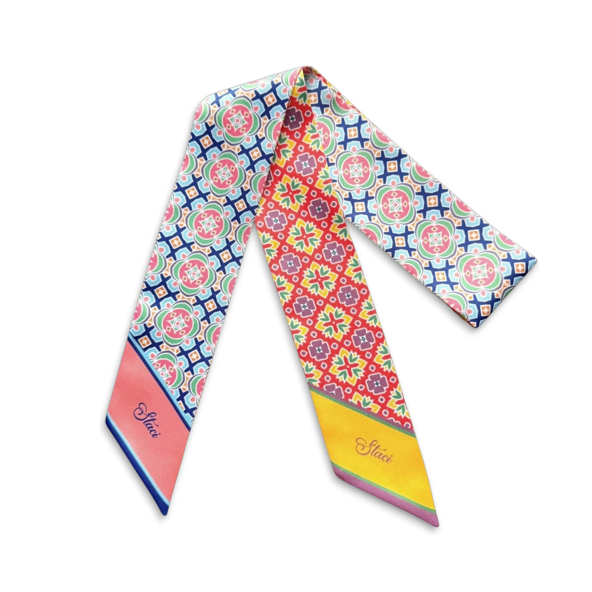 Handbag twilly scarf with intricate repeating geometric patterns inspired by batik and vibrant contrasting colours.