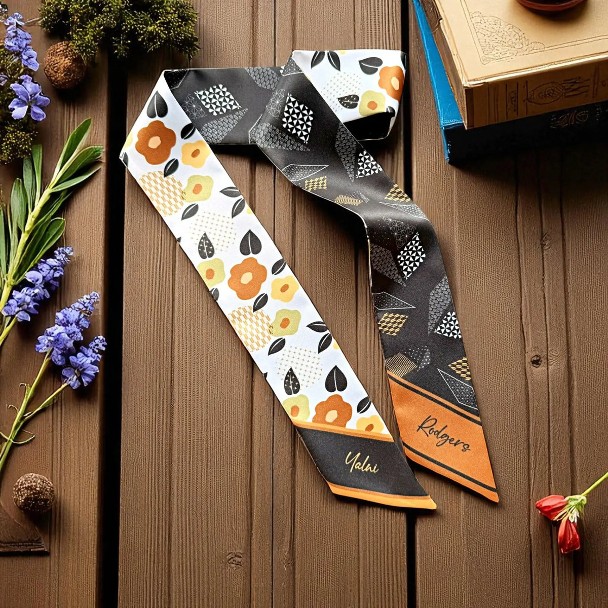 Double-sided twilly scarf with floral and geometric pattern in brown, black and orange tones