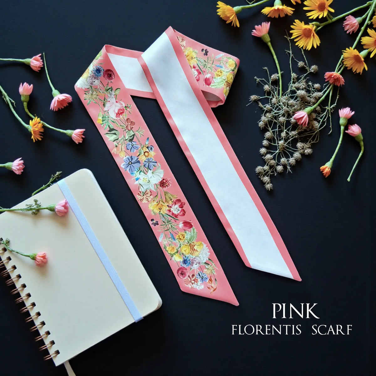 Pink personalised twilly scarf decorated with colourful watercolour wildflowers, featuring soft pink borders and custom lettering.