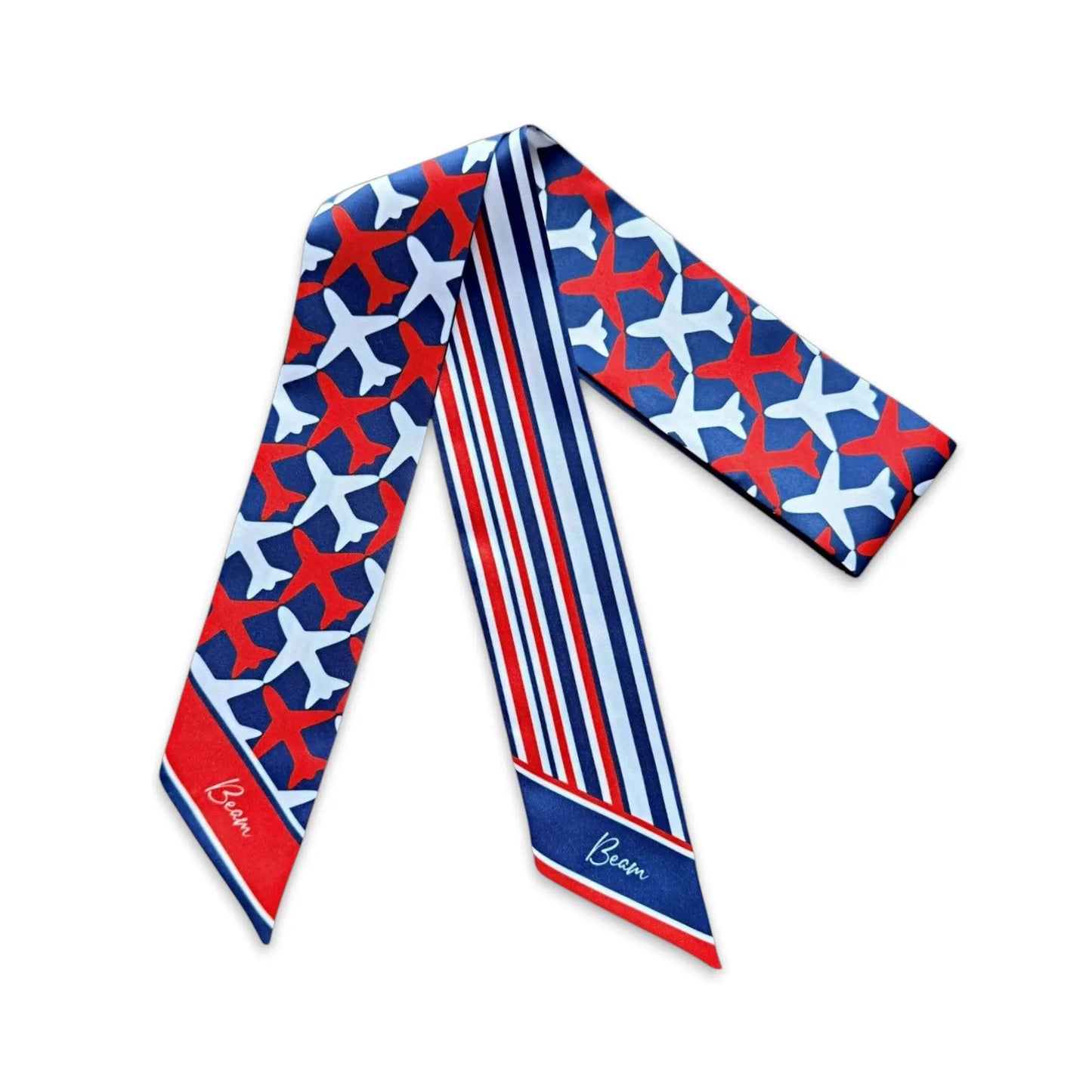 Modern twilly scarf with repeating airplane pattern and contrasting striped detail in red, white and blue palette