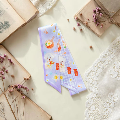 Lavender novelty twilly scarf featuring Bichon dogs, fried eggs, bacon and cooking motifs