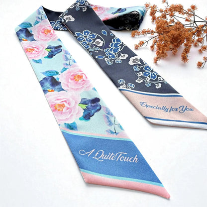 Elegant botanical skinny scarf with pink blossoms, blue foliage and ornamental floral details