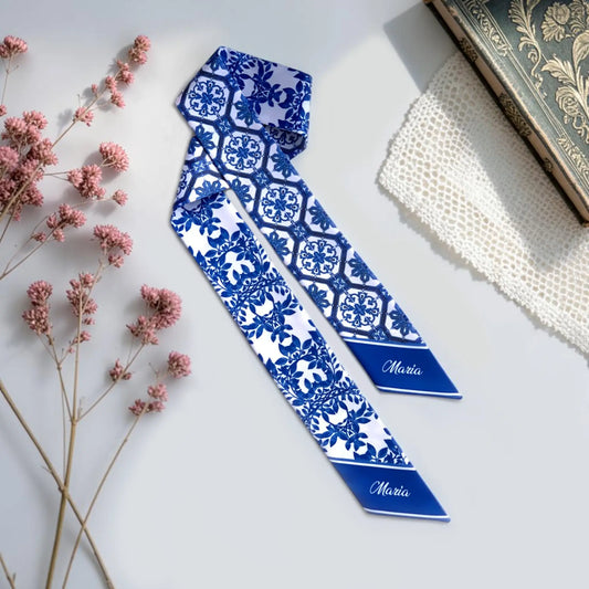 Blue and white Chinoiserie twilly scarf featuring porcelain-inspired tile motifs and elegant botanical foliage