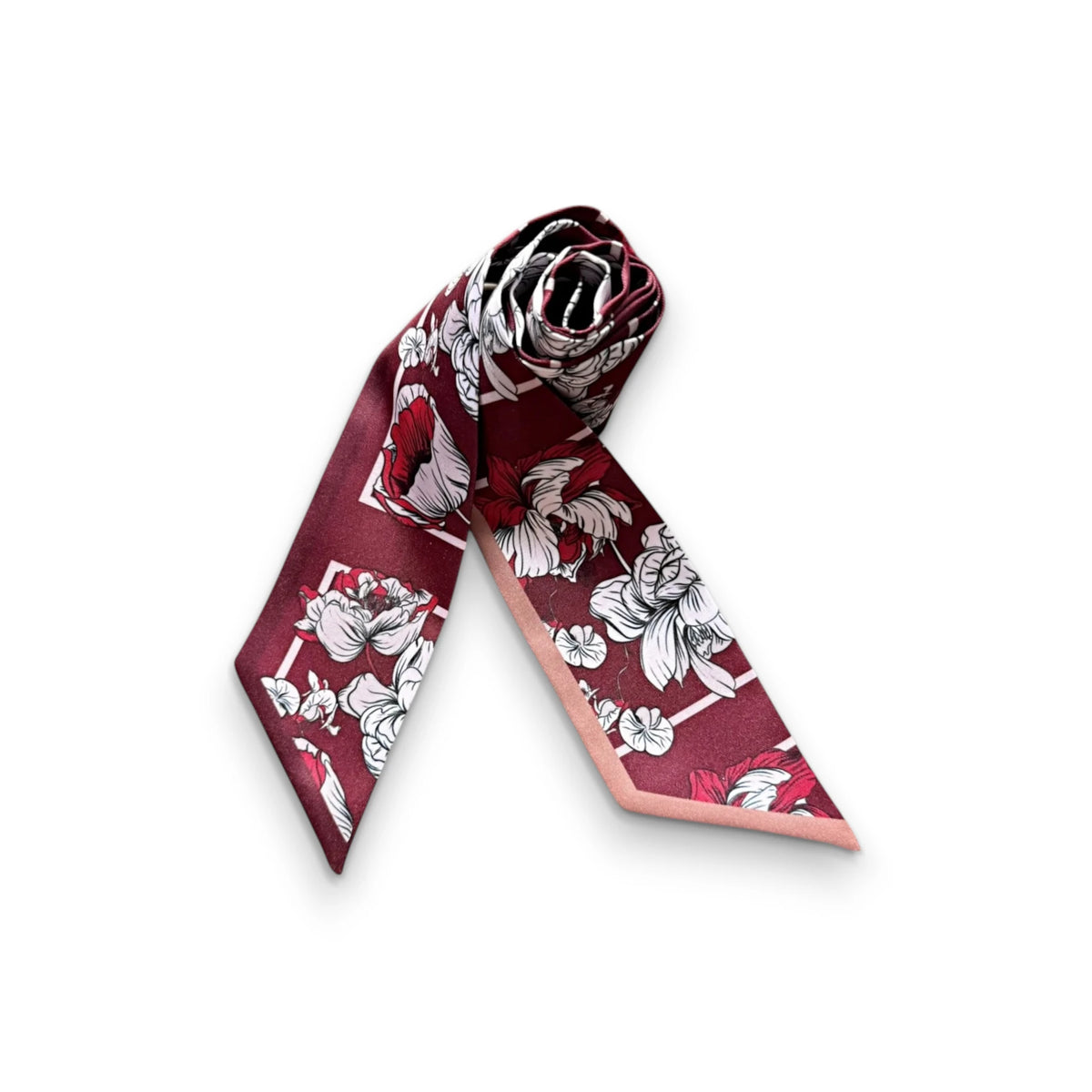 Maroon botanical skinny scarf with elegant vintage flower illustrations and blush pink accents, folded into a decorative bow shape.