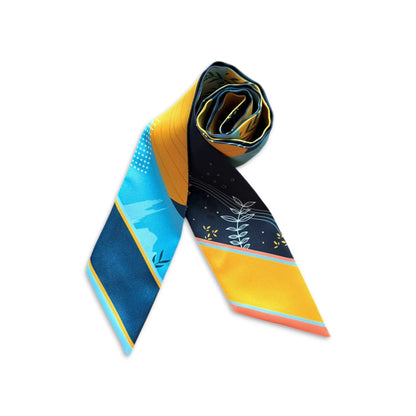 Double-sided silk twilly scarf with contemporary leaf print and colour block design in blue and yellow tones