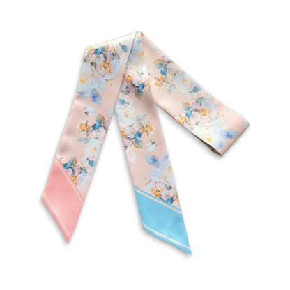 Feminine twilly scarf with gentle botanical flowers in soft pink and light blue hues