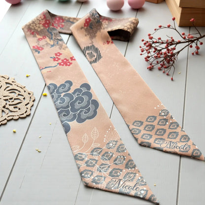 Elegant personalized twilly scarf gift with oriental floral pattern in soft beige and earthy tones