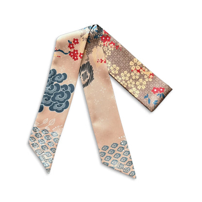 Personalized twilly scarf with delicate floral motifs in warm beige tones, ideal as a thoughtful gift