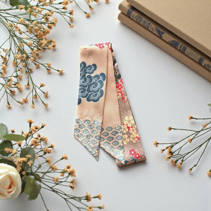 Custom name skinny scarf with Japanese-inspired floral design in neutral beige palette, perfect for a gift