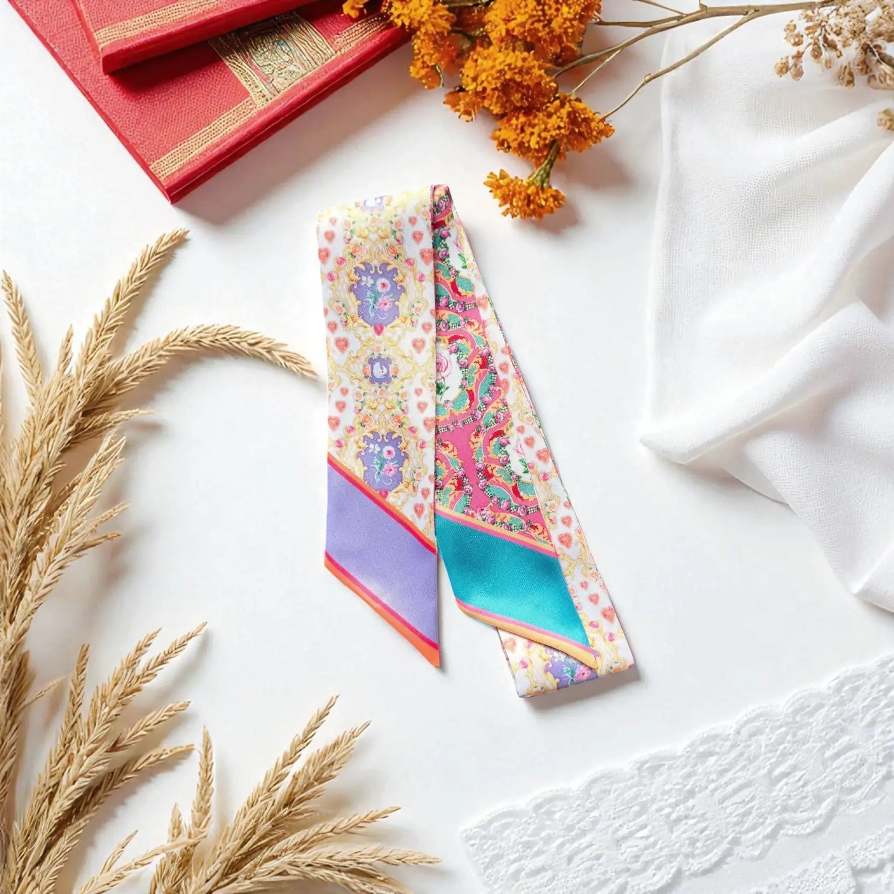Elegant skinny twilly scarf featuring rococo style baroque ornamental floral design for luxury handbag accessory