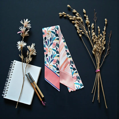 Elegant personalized twilly scarf with baroque-inspired floral print and soft pastel pink palette, perfect as a stylish gift.