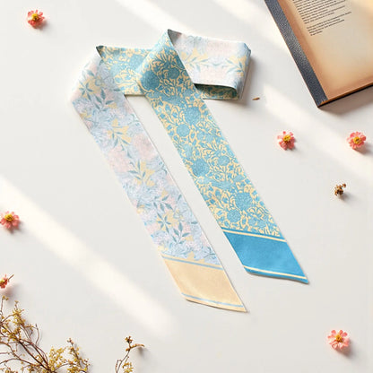 Vintage botanical floral twilly scarf in powder blue and cream with elegant ornamental flower patterns