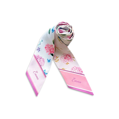 Custom name floral twilly scarf in pink and ivory with hydrangea blossoms, butterflies, and delicate botanical details, ideal for bridesmaid gifting.