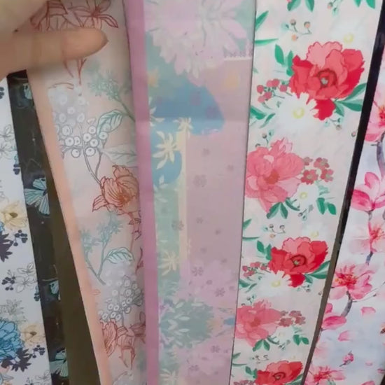 Video showing Amethyst twilly scarf with pastel floral and subtle geometric pattern