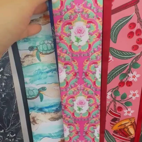 Video showing Antoinette twilly scarf with vintage ornamental floral pattern in multicolor design