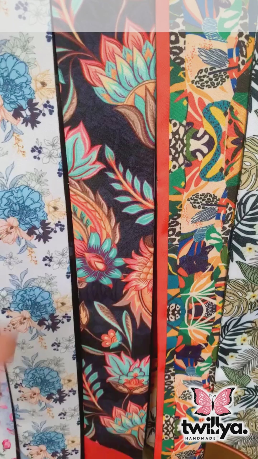 Video showing Annika twilly scarf with bold tropical floral pattern in multicolor design