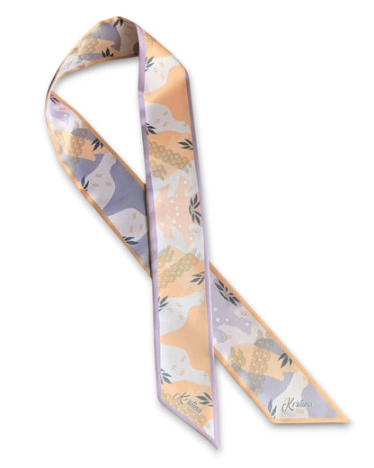 Video showing twilly scarf with abstract botanical design in beige and gray colors