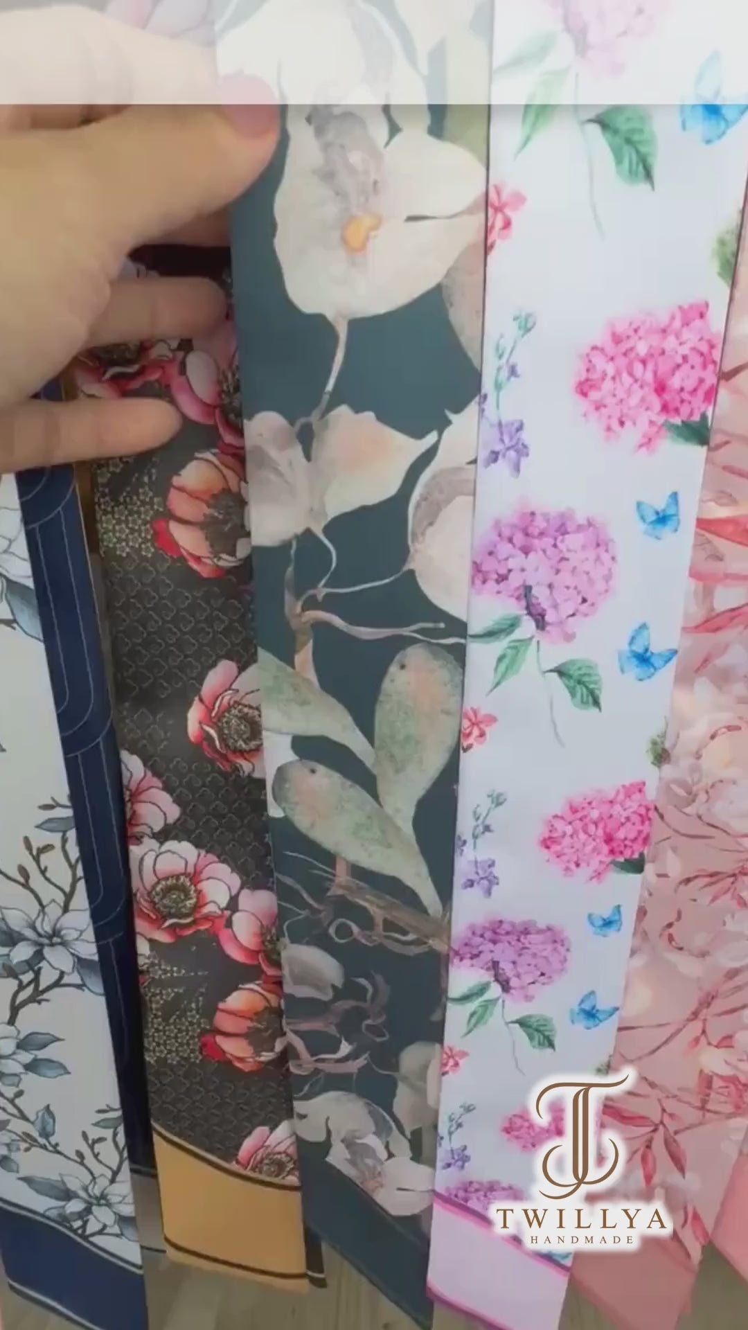 Personalized deep teal skinny scarf featuring elegant watercolor-style ivory flowers, sage green foliage, delicate branches, and custom name detailing on pointed ends.