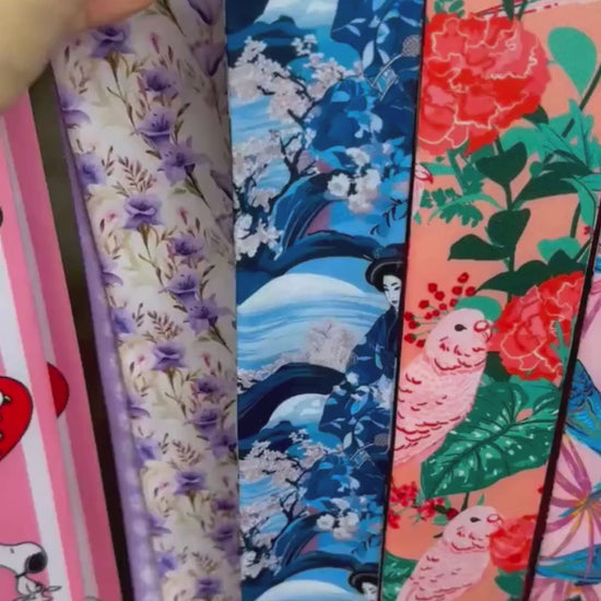 Personalized Japanese-inspired twilly scarf showcasing delicate cherry blossoms, flowing blue waves, navy and pink accents, and custom name details. A versatile skinny scarf for handbags, hair styling, and gifting.